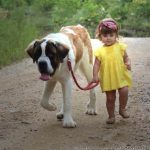 cute-little-girl-walking-with-her-best-friend